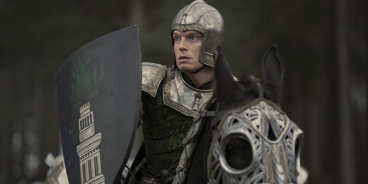 Gwayne Hightower (Freddie Fox) holding a shield and wearing armor on a horse in House of the Dragon
