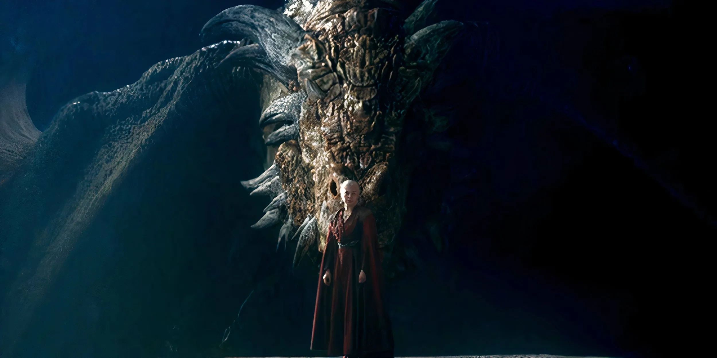 Rhaenyra Targaryen standing in front of Vermithor on House of the Dragon