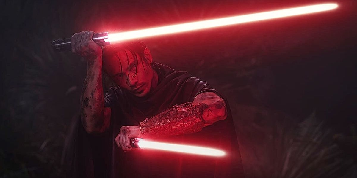 The Stranger (Manny Jacinto) brandishes two red lightsabers in The Acolyte