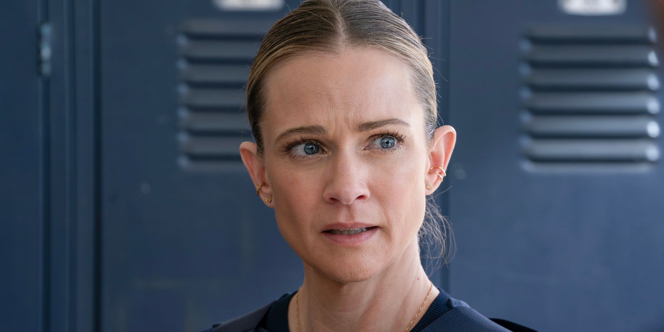 JJ Jareau (actor AJ Cook) looks serious in front of lockers in Criminal Minds: Evolution Season 2