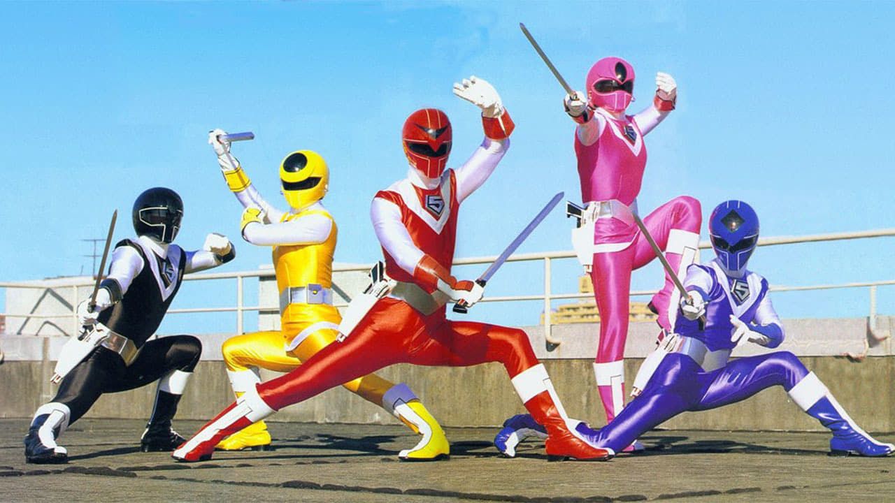 Grupo Hikari Sentai Maskman posando com armas