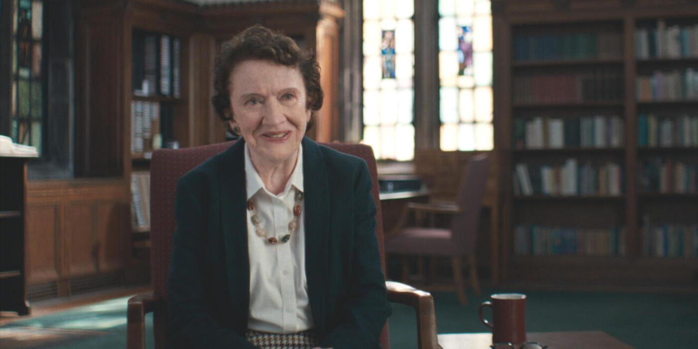 Dr. Ann Burgess sits in a library in a black suit in in Hulu's Mastermind: To Think Like a Killer