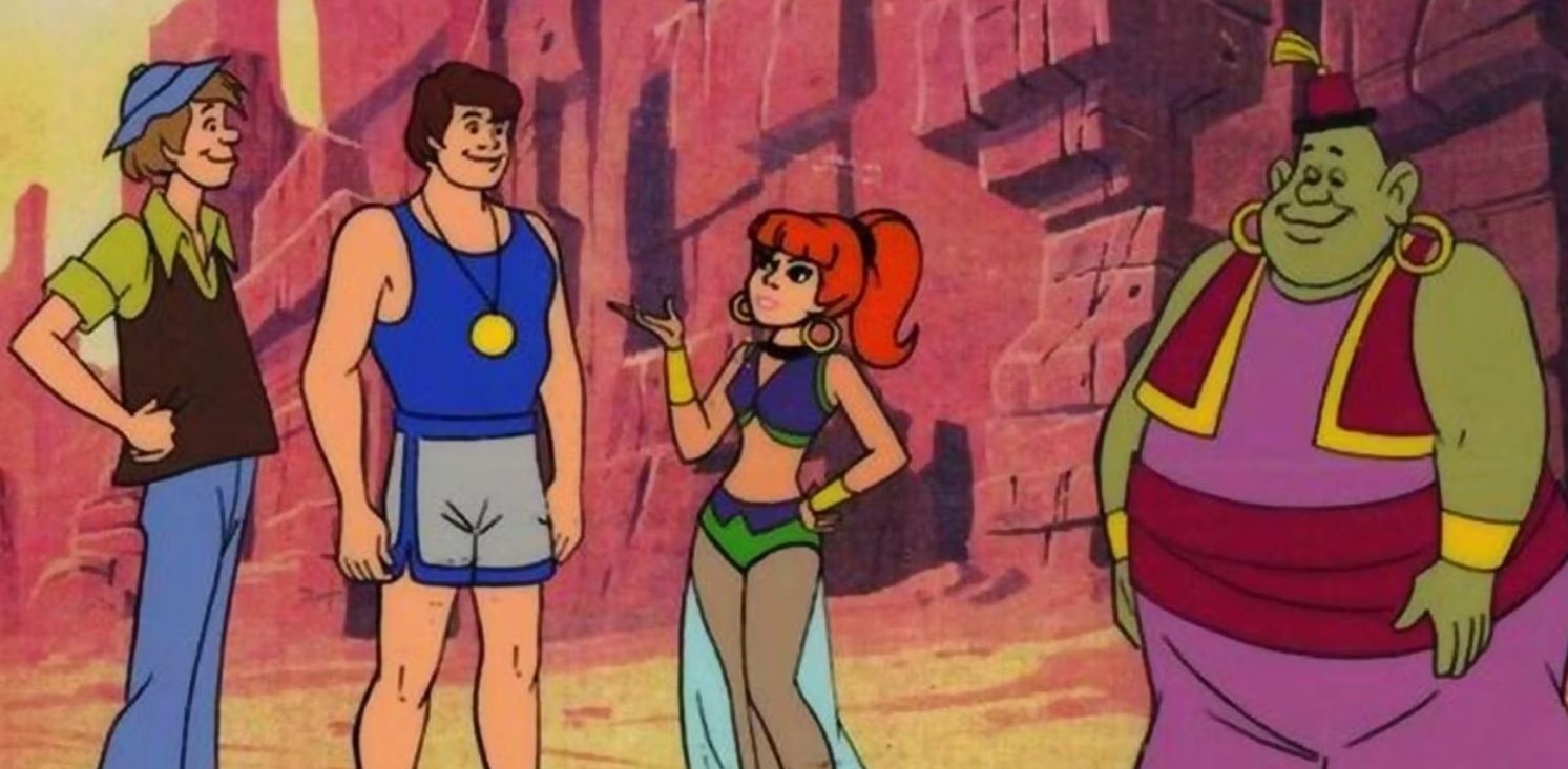 Jeannie fala com Corey Anders no deserto no desenho animado Jeannie da Hanna-Barbera.