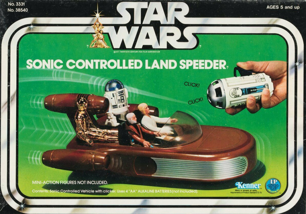 A close-up shows a Kenner toy version of Luke Skywalker's land speeder from Star Wars.