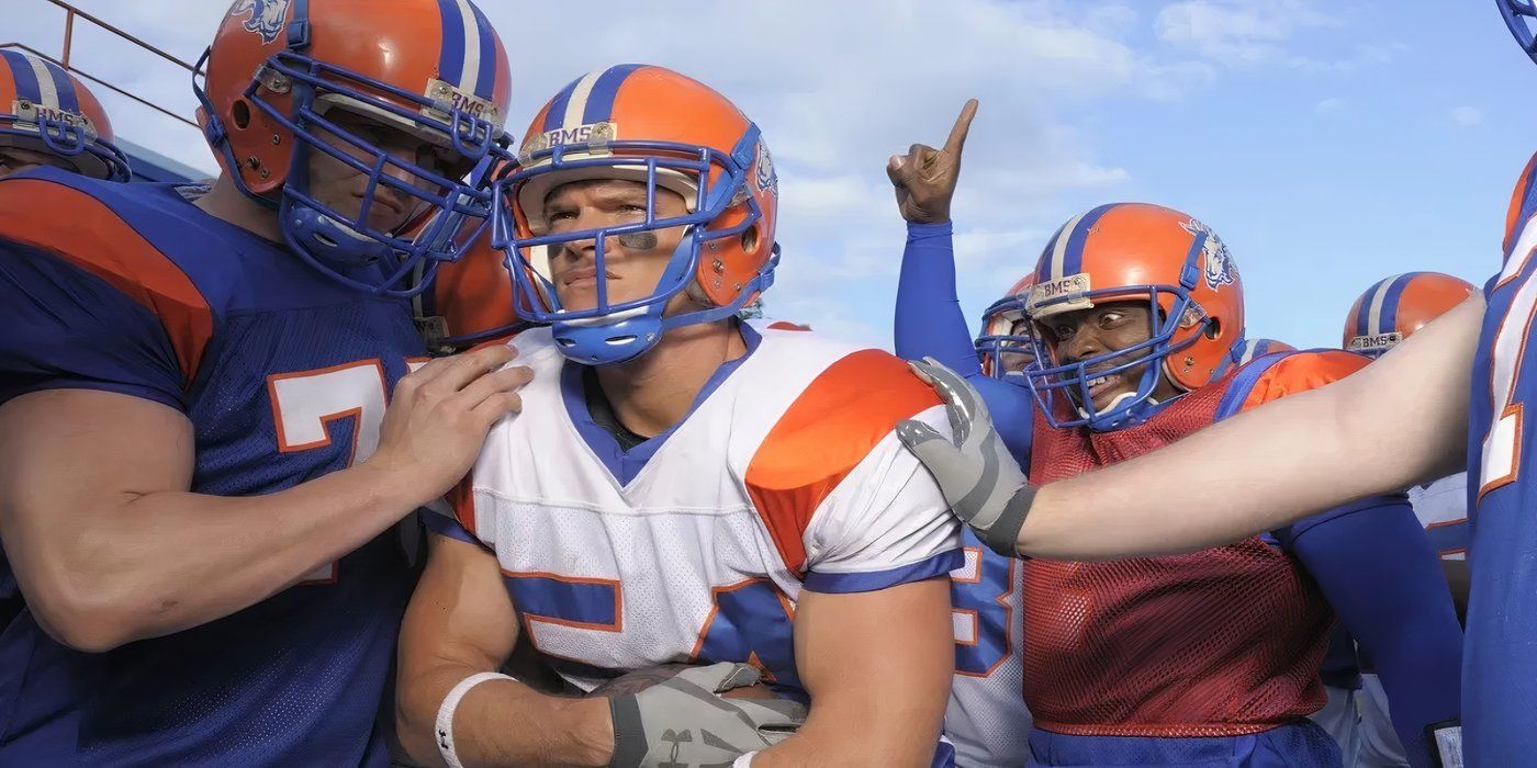 Thad Castle is surrounded by his football team in Blue Mountain State