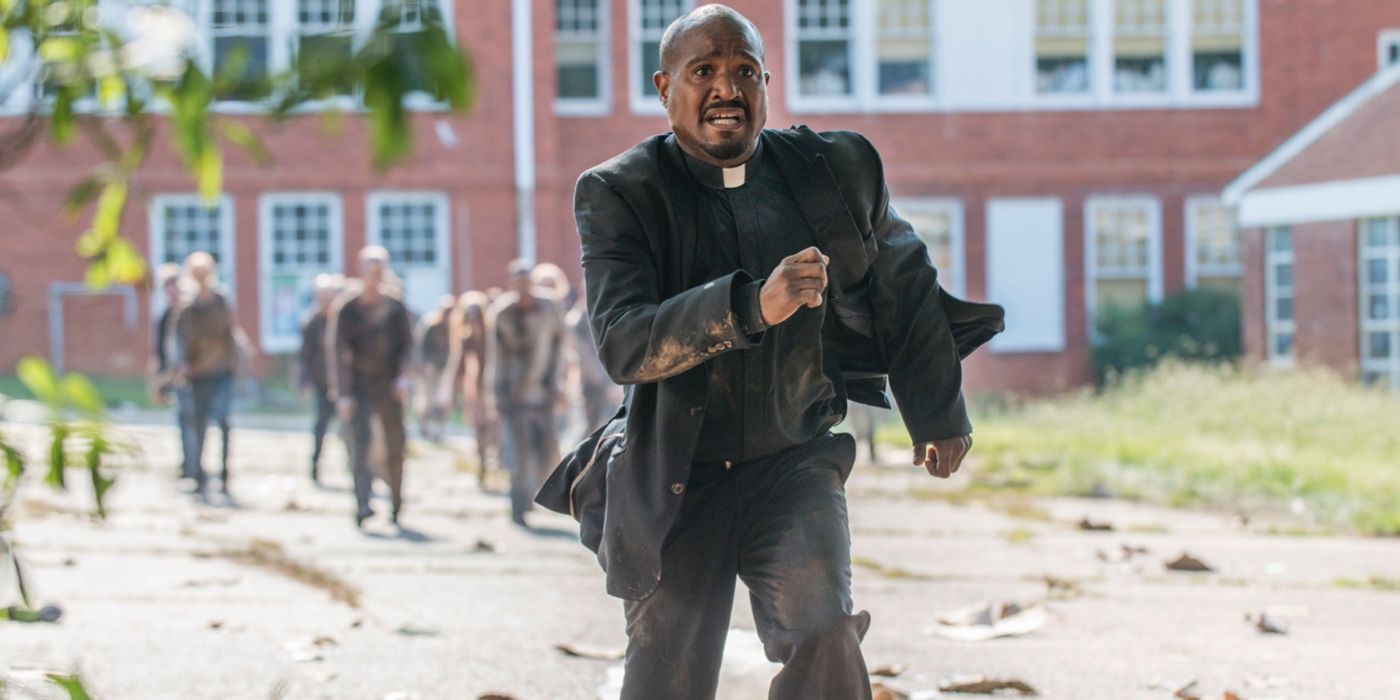 Gabriel Stokes running from walkers on The Walking Dead