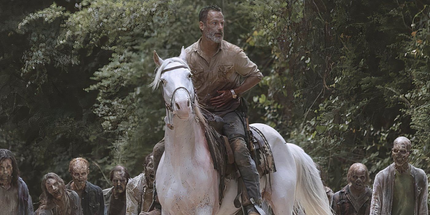 Rick Grimes (Andrew Lincoln) rides a horse with walkers behind him, holding his gut that's bleeding on The Walking Dead.