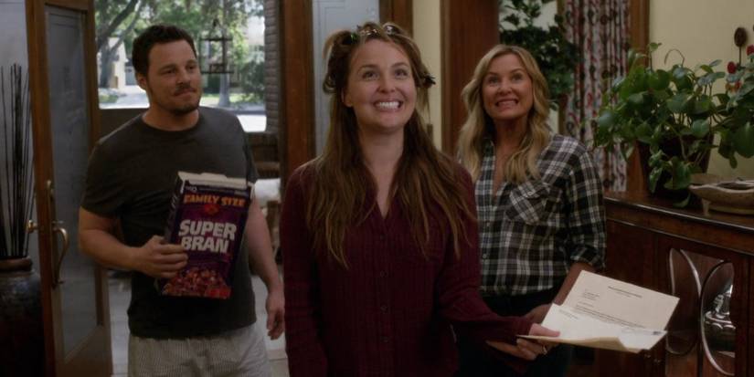 Alex Karev and Arizona Robbins with Jo Wilson on Alex's wedding day at Meredith in Grey's Anatomy