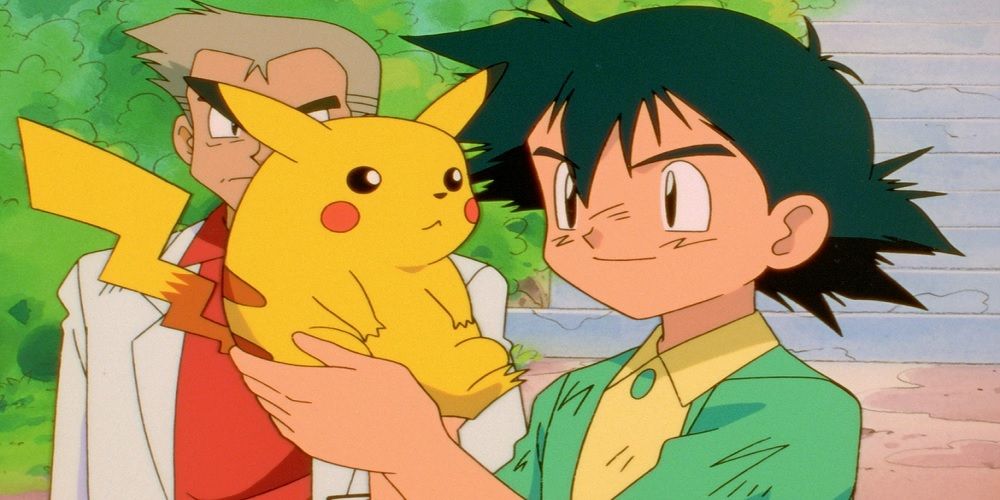 Ash smiles and holds his new Pikachu, behind him stands Professor Oak from Pokemon.