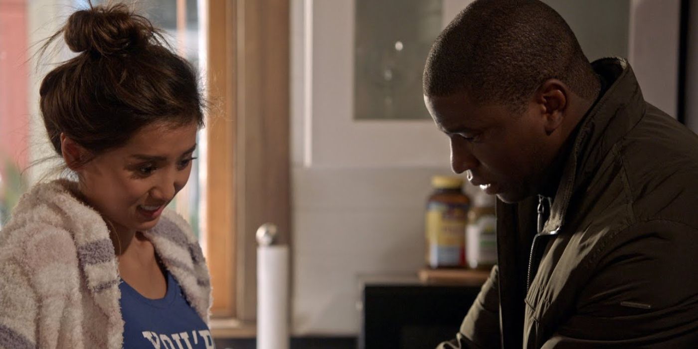 Brenda Song as JJ Lau sits with Okieriete Onaodowan as Dean Miller on Station 19