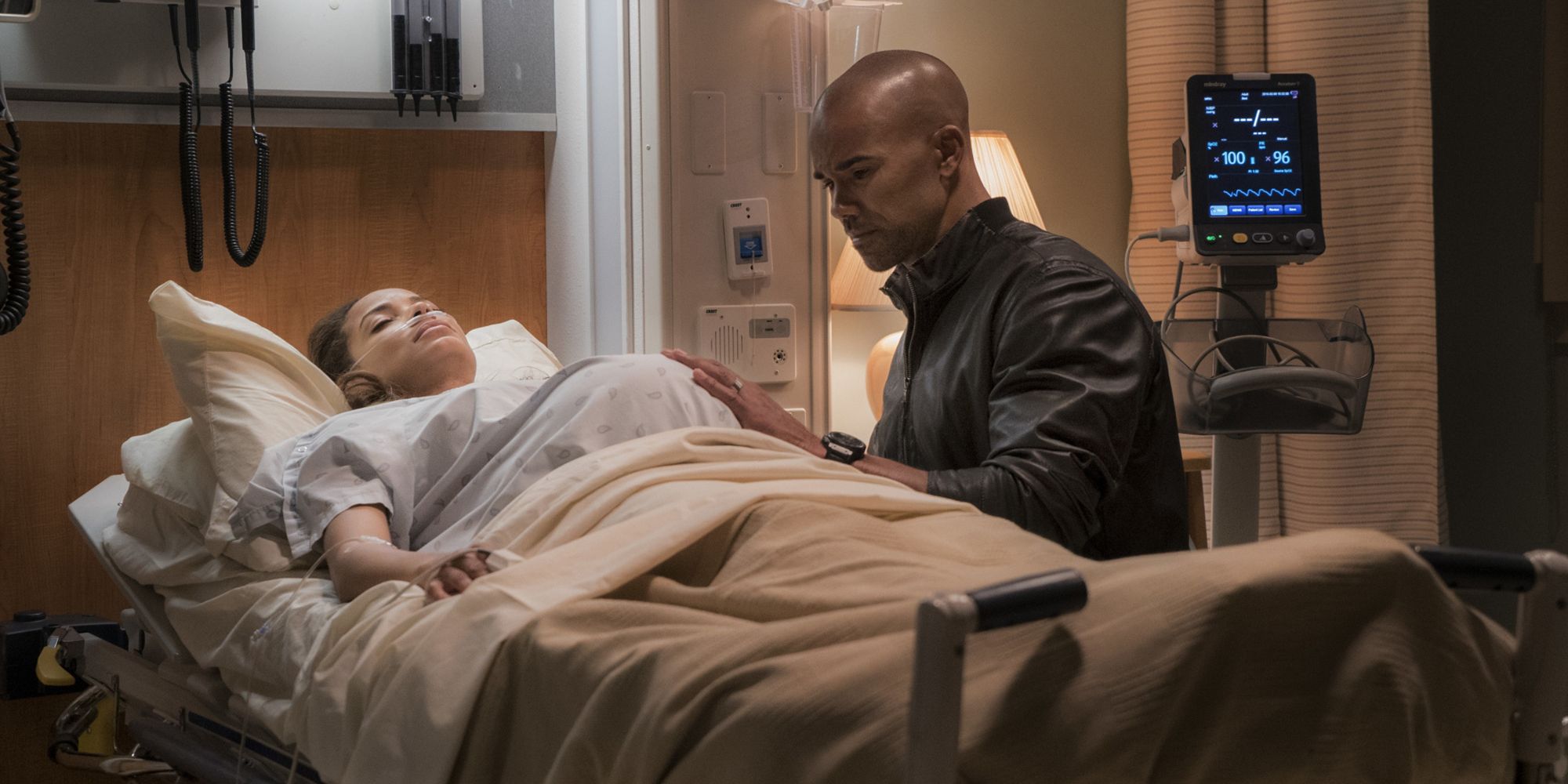 Derek Morgan cares for Savanah while she's hospitalized in the Criminal Minds episode "A Beautiful Disaster."