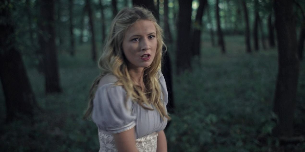 Eliza Bennet as Snow White in the woods from Grimm's Snow White (2012)