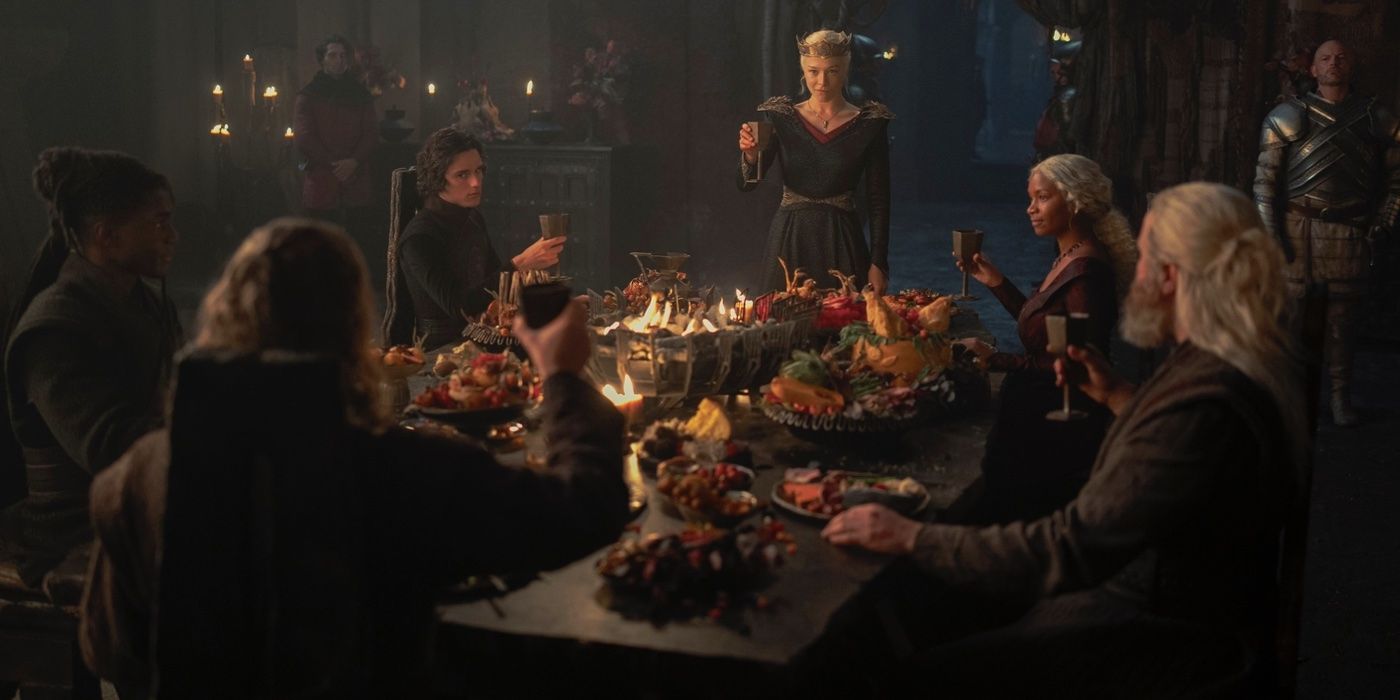 Rhaenyra raising her cup at dinner with the dragonseeds, Jacaerys, and Baela on House of the Dragon