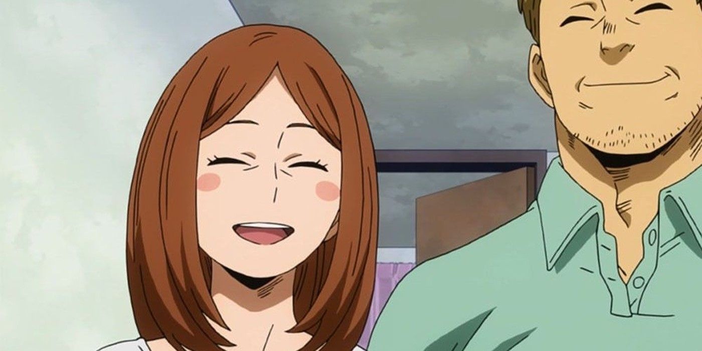 Mrs. Uraraka smiles next to her husband.