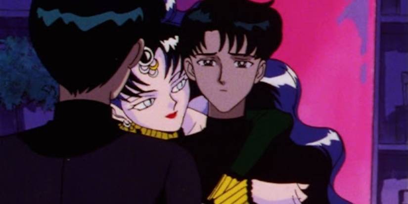 Queen Nehelenia entwining herself around Mamoru in the anime Sailor Moon.