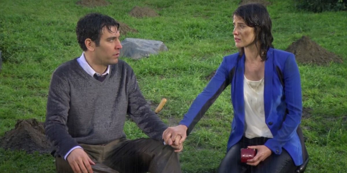 Robin Scherbatsky e Ted Mosby de mãos dadas depois de não conseguirem desenterrar o medalhão de Robin enquanto chovia em How I Met Your Mother