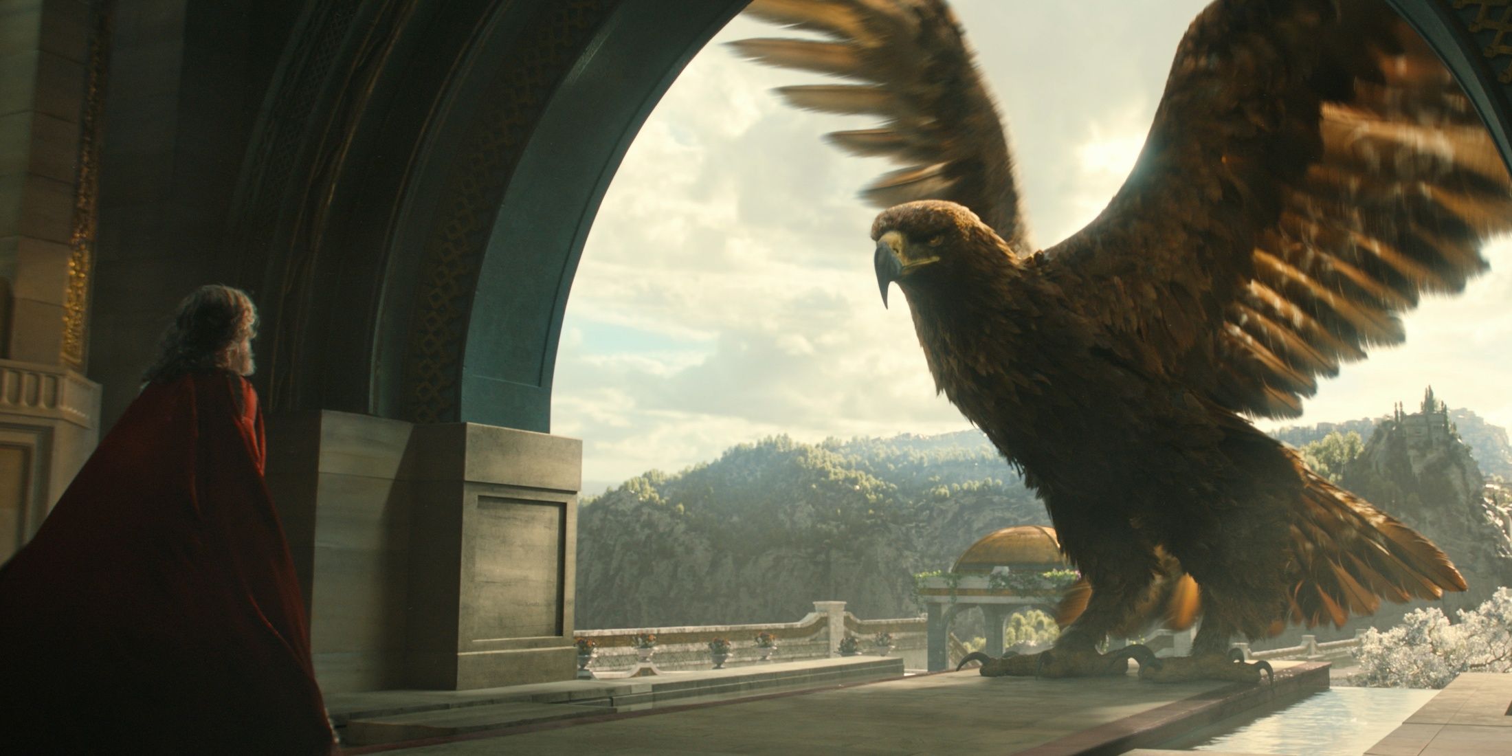 A giant eagle lands in a castle window in front of Pharazon in The Rings of Power Season 2