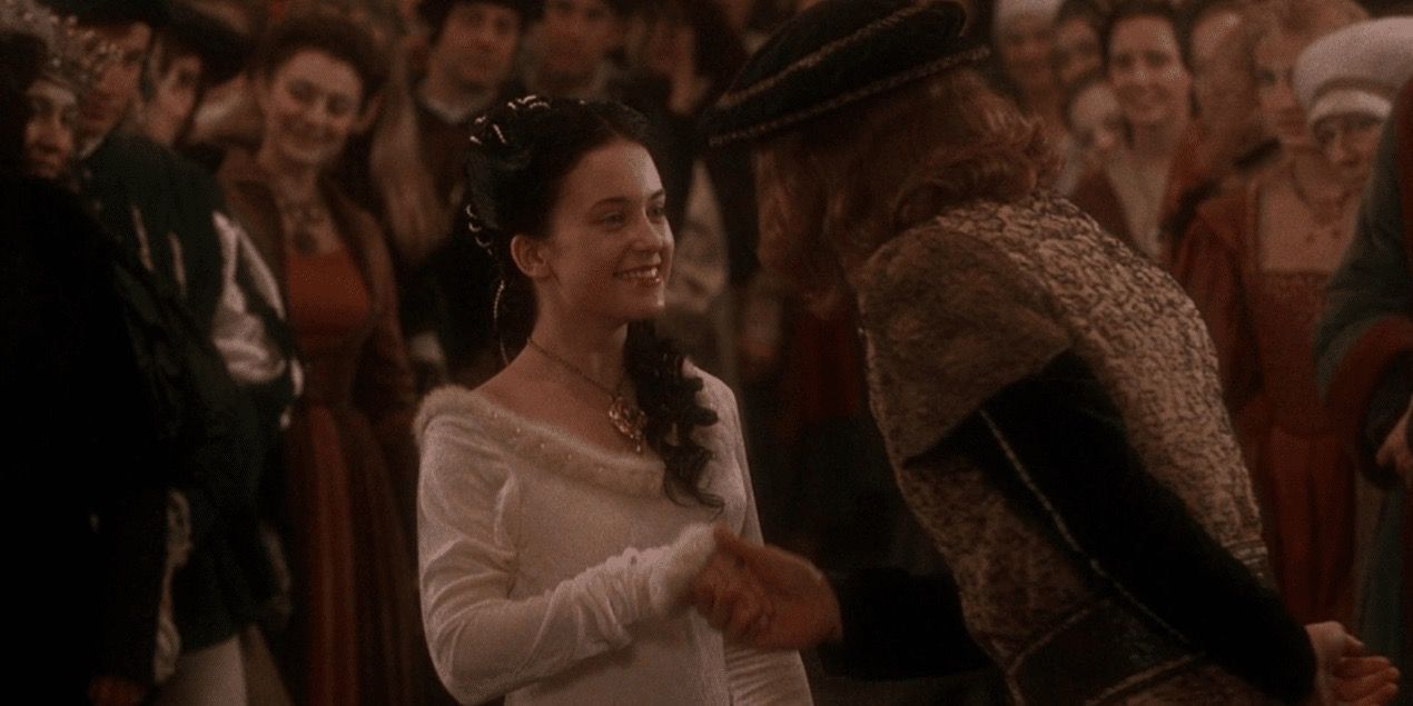 Monica Keena as Liliana with her father at the ball from Snow White: a Tale of Terror (1997)