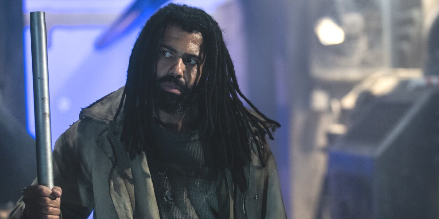 Layton (actor Daveed Diggs) stands with a pipe and looks to the left in season 4 of Snowpiercer