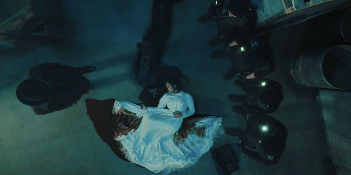 Reginald Hargreeves stands over the bodies of Ben and Jennifer in “The Umbrella Academy”