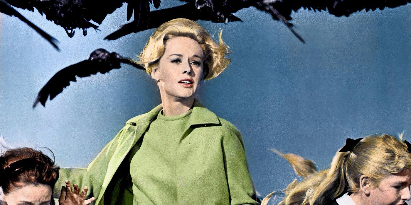 Tippi Hedren running with children from birds in The Birds