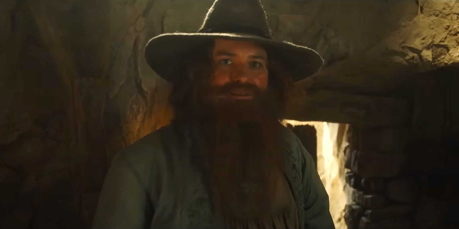 Tom Bombadil (Rory Kinnear) looks mischievous in The Lord of the Rings: The Rings of Power