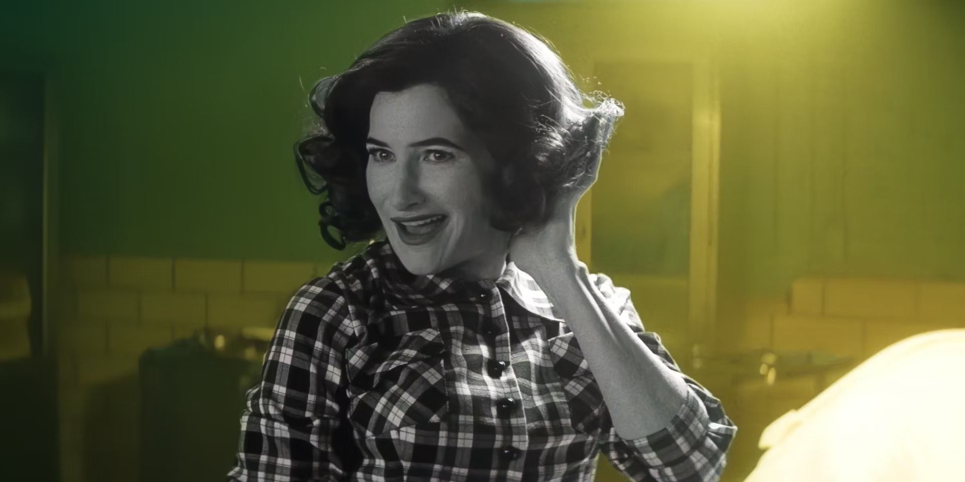 Kathryn Hahn as Agatha Harkness as Agnes in black and white during the first episode of Agatha All Along.