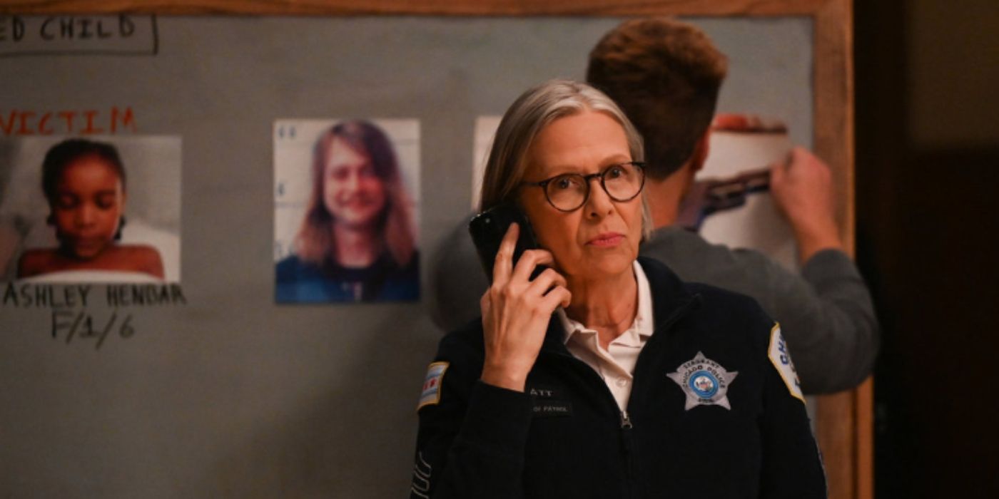 Amy Morton as Trudy Platt stands in front of a chalkboard with case information on it on Chicago PD