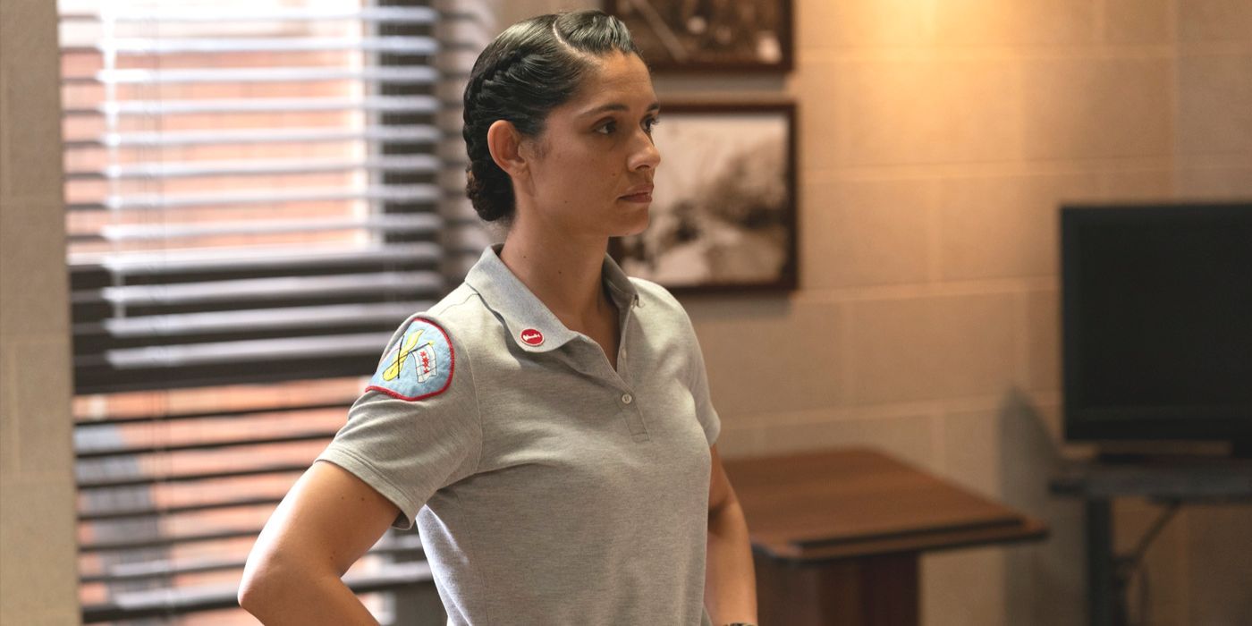 Stella Kidd, played by Miranda Rae Mayo, stands in a grey top with hands on her hips in Chicago Fire