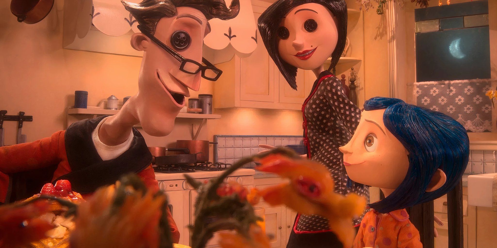 Coraline is sitting at the kitchen table with her Other Family in Coraline