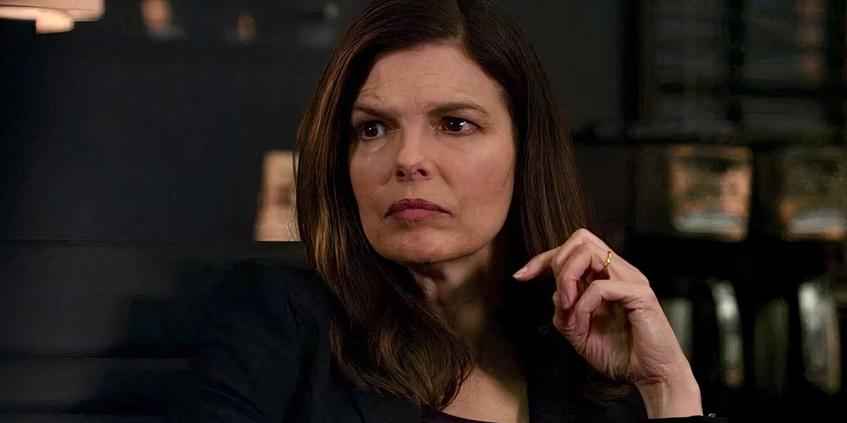 Alex Blake in a meeting room in Criminal Minds