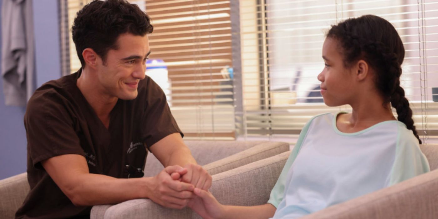 Darren Barnet as John Frost speaks with a patient on Chicago Med