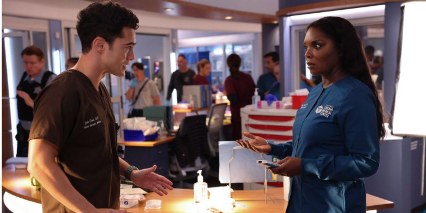 Darren Barnet as John Frost talks with Marlyne Barrett as Maggie Lockwood on Chicago Med