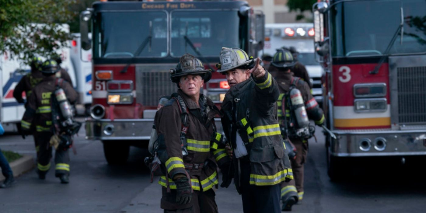 David Eigenberg as Christopher Herrmann takes directions from Dermot Mulroney as Dom Pascal on Chicago Fire