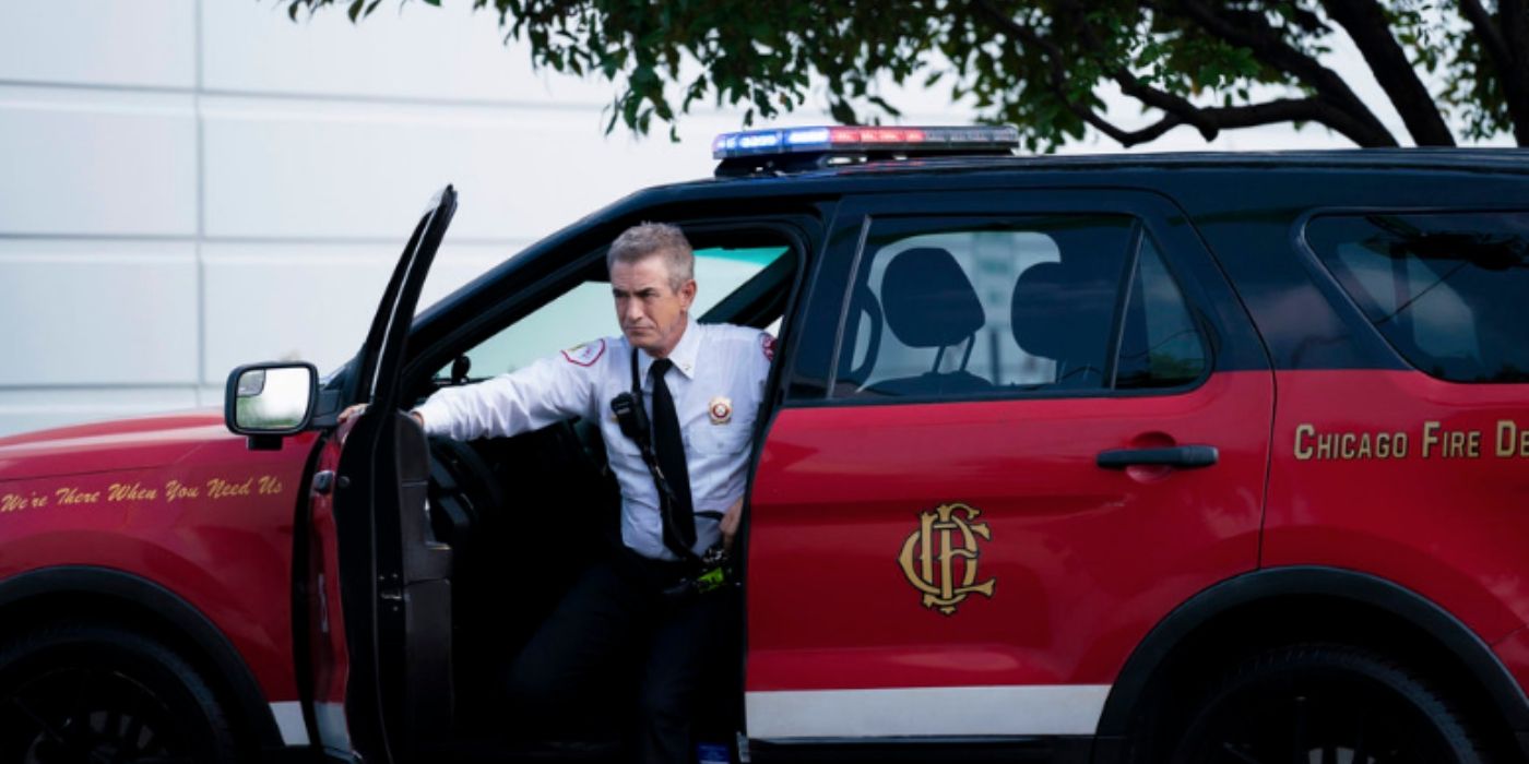 Dermot Mulroney as Dom Pascal exits his Chicago Fire Department vehicle on Chicago Fire