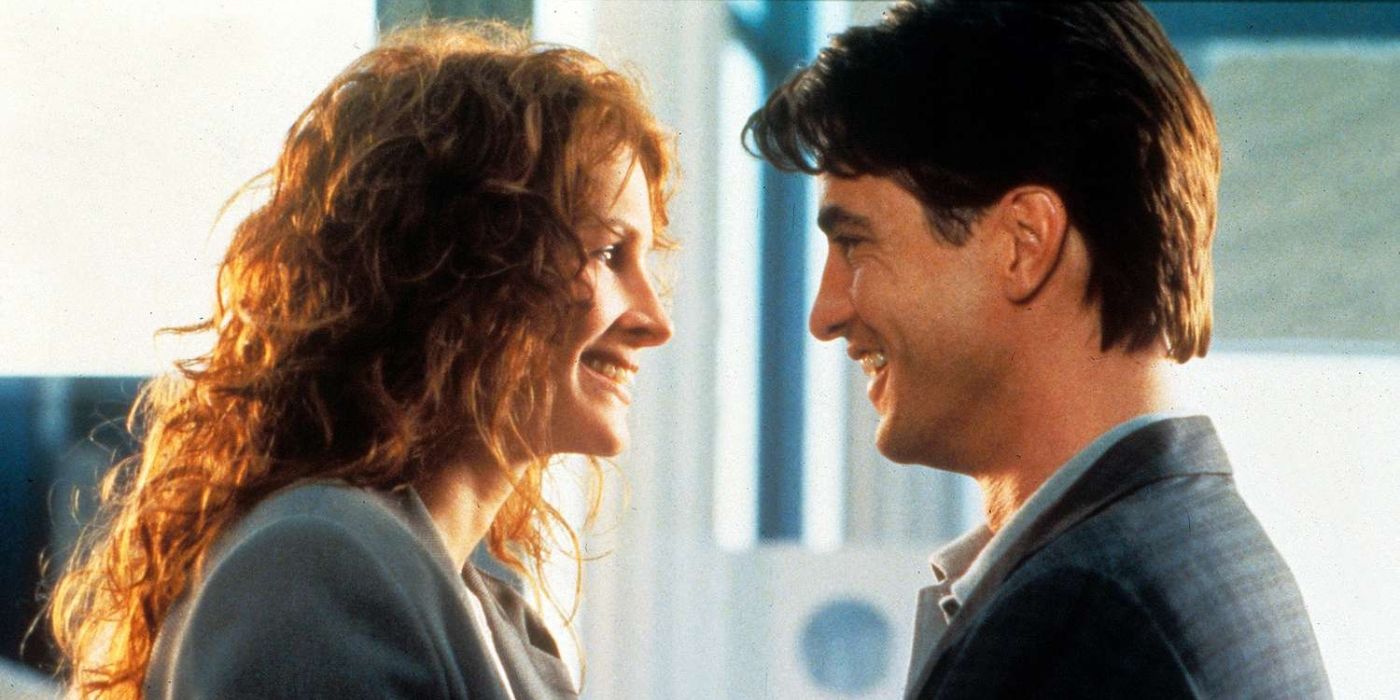 Julia Roberts as Julianne Potter and Dermot Mulroney as Michael O'Neal smile at each other in My Best Friend's Wedding