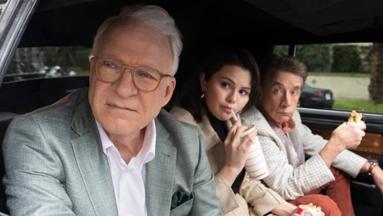 Charles, Mabel and Oliver are in the back of a taxi cab in Only Murders in the Building Season 4