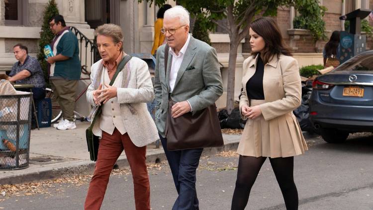 Martin Short, Steve Martin and Selena Gomez walk across the street in Only Murders in the Building Season 4