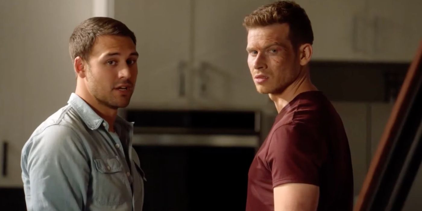 Ryan Guzman as Eddie Diaz and Oliver Stark as Evan 'Buck' Buckley look offscreen on 9-1-1