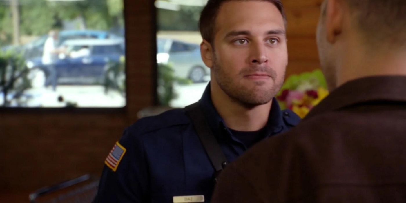 Ryan Guzman as Eddie Diaz confronts Oliver Stark as Evan 'Buck' Buckley who is facing away from the camera in a grocery store on 9-1-1