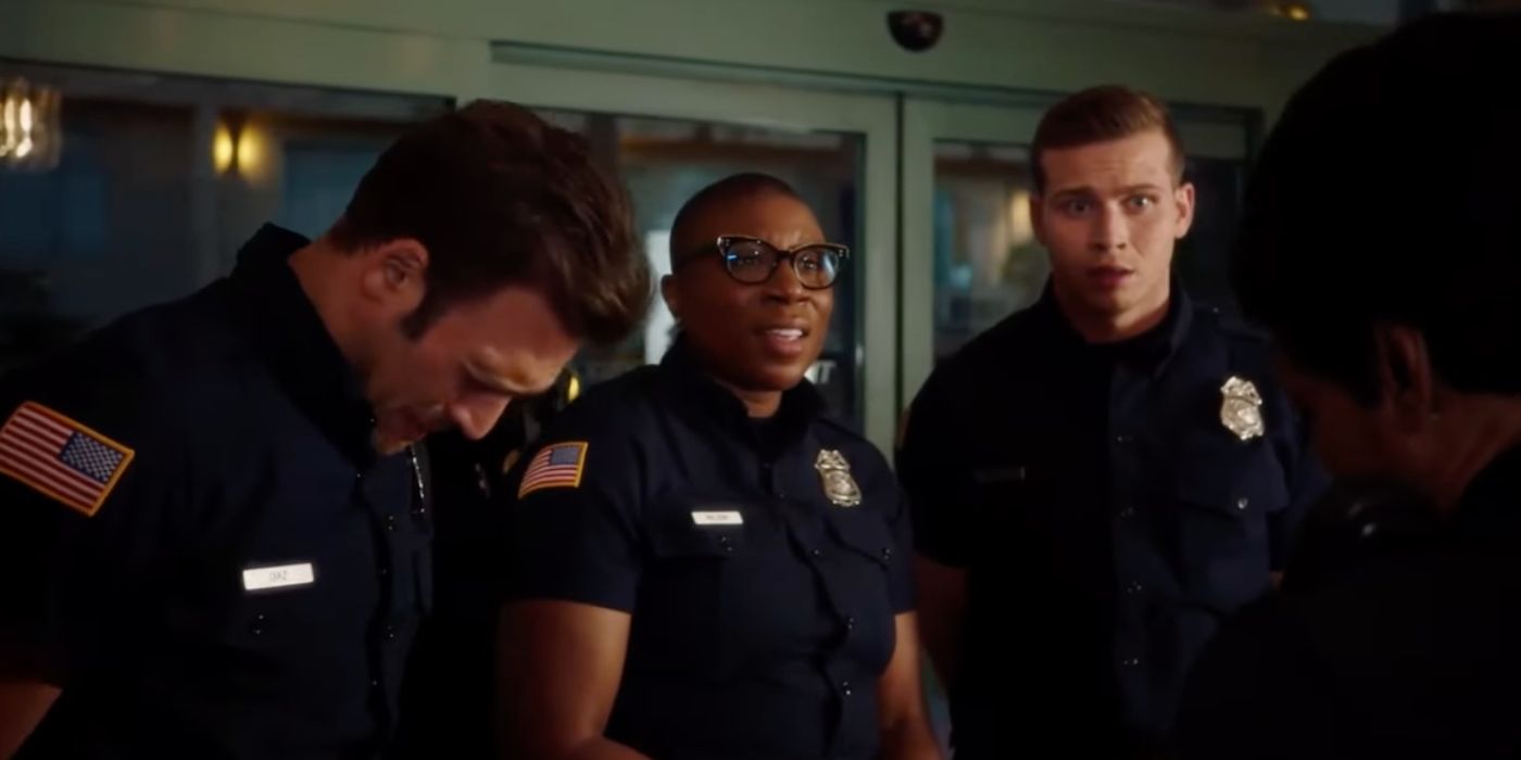 Ryan Guzman as Eddie Diaz hands his hand while Aisha Hinds as Henrietta 'Hen' Wilson and Oliver Stark as Evan 'Buck' Buckley stand next to him in front of Angela Bassett as Athena Grant on 9-1-1