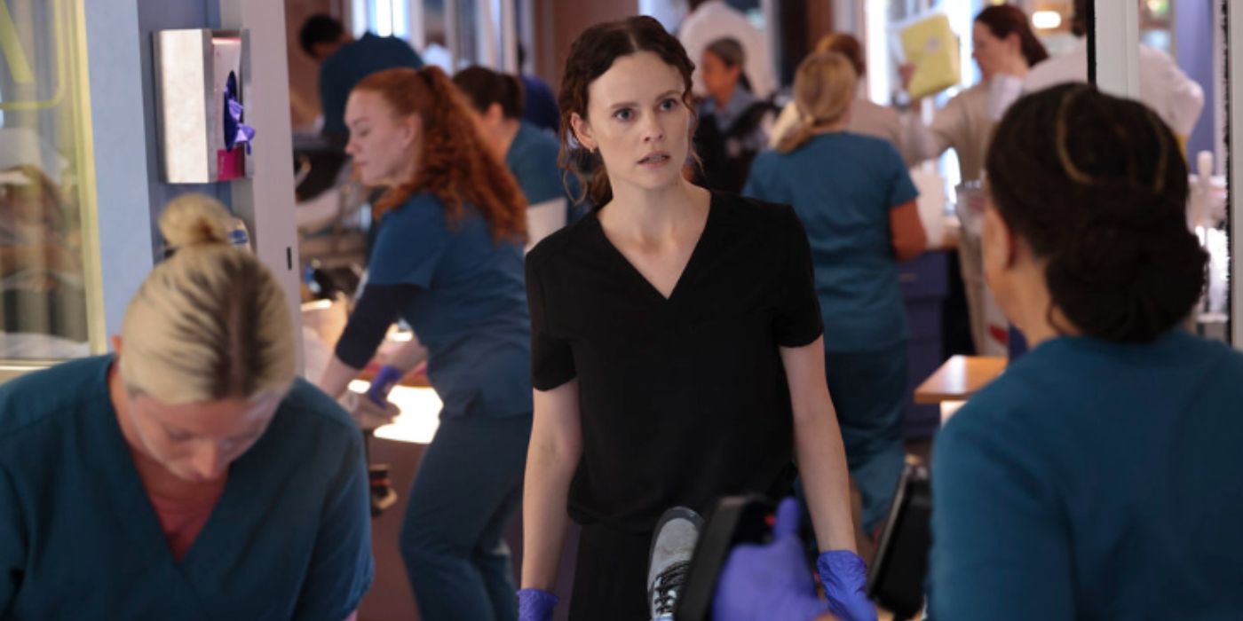 Sarah Ramos as Caitlin Lenox looks stunned while talking with S. Epatha Merkerson as Sharon Goodwin who is facing away from the camera on Chicago Med