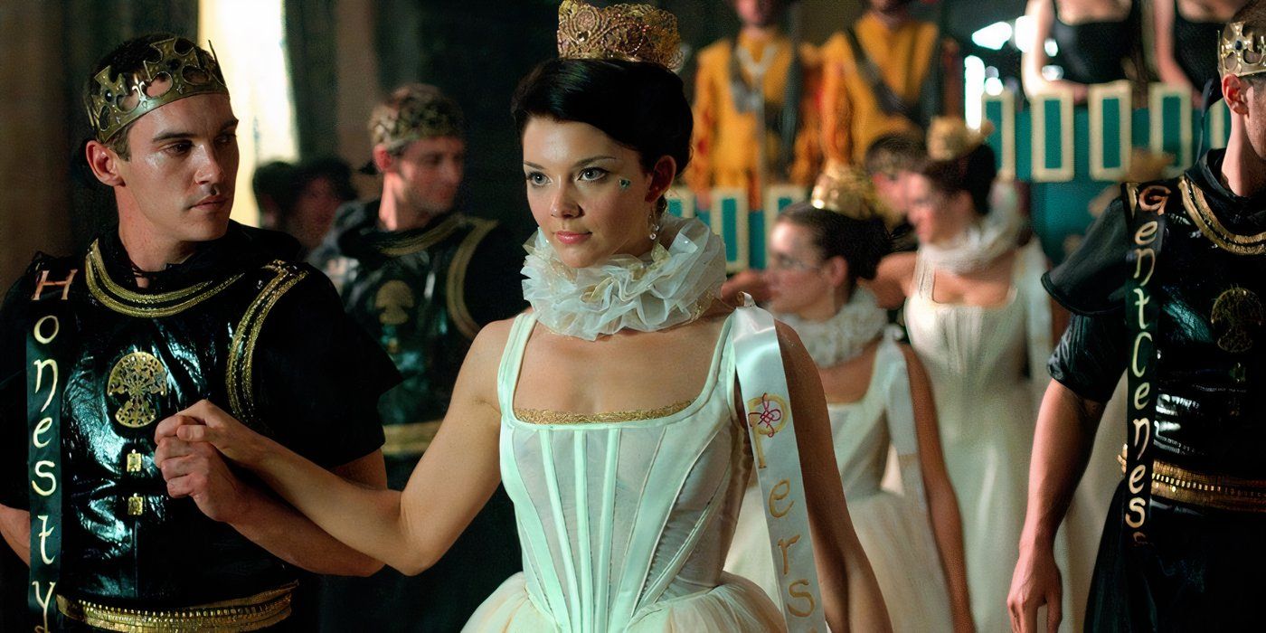 King Henry VII (Jonathan Rhys Myers) and his second wife, Anne Boleyn (Natalie Dormer), are holding hands while walking down an aisle in The Tudors.