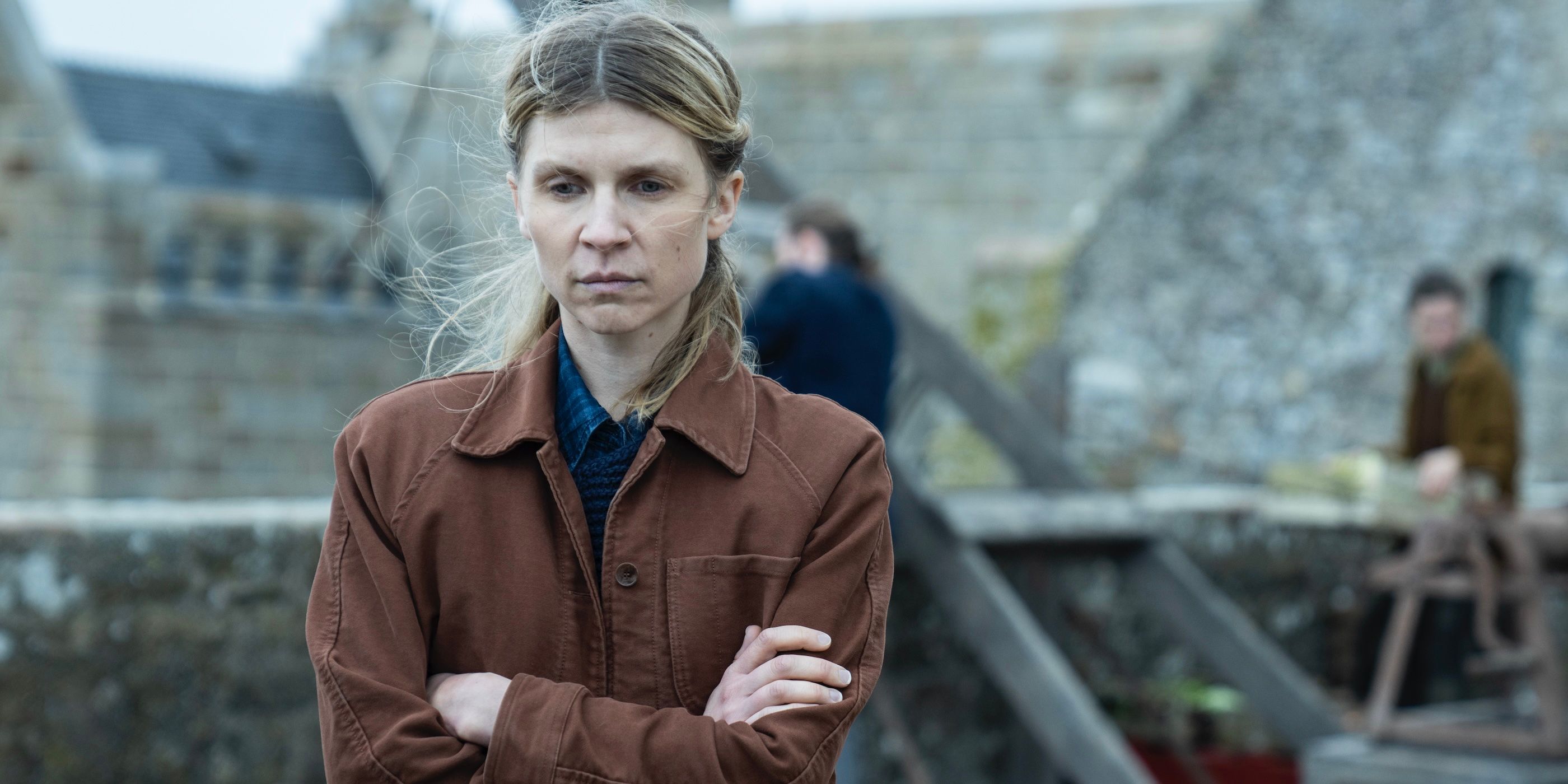 Isabelle Carrier (Clémence Poésy) standing with her arms crossed on The Walking Dead: Daryl Dixon