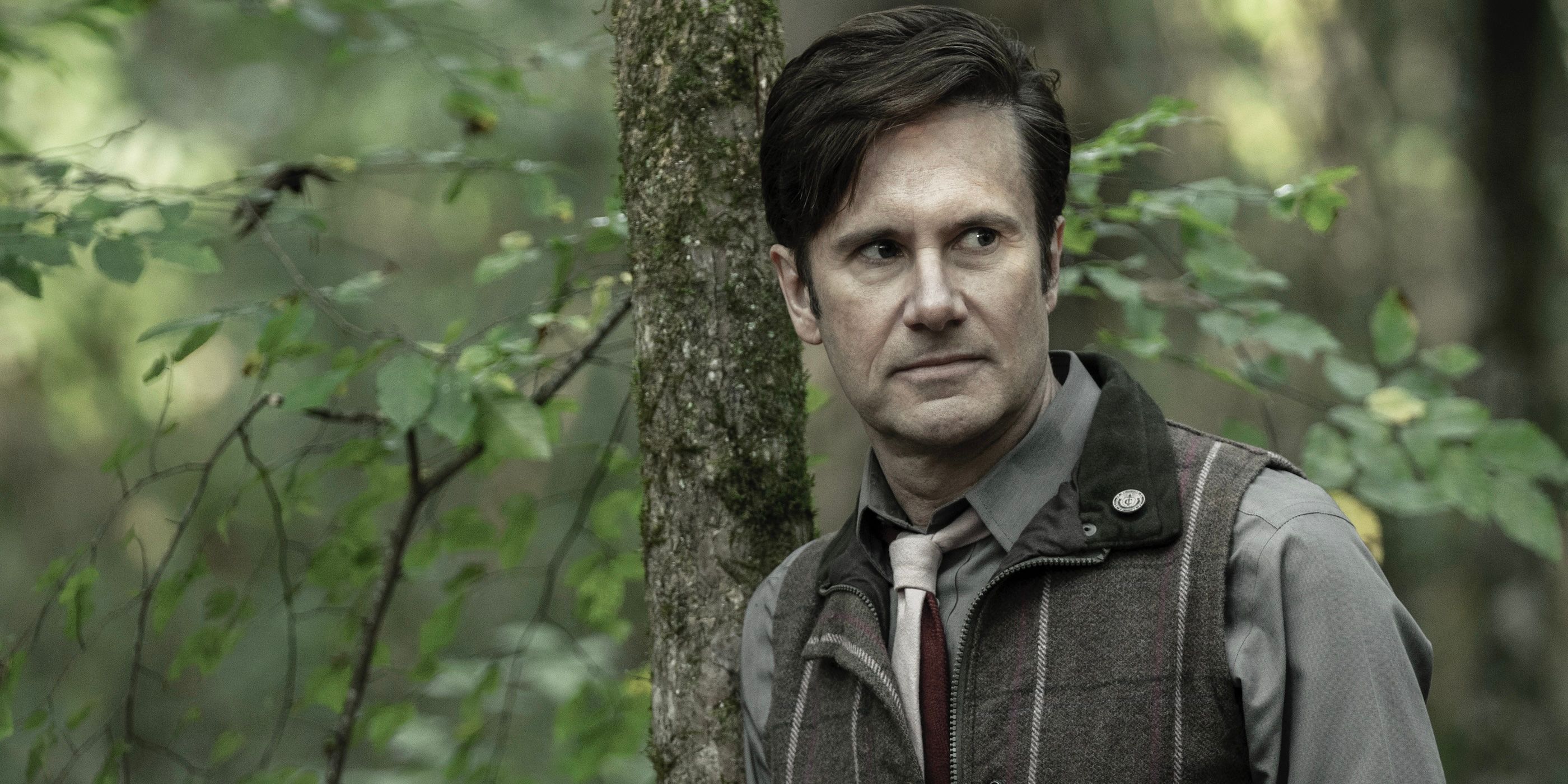 Lance Hornsby in a forest on The Walking Dead