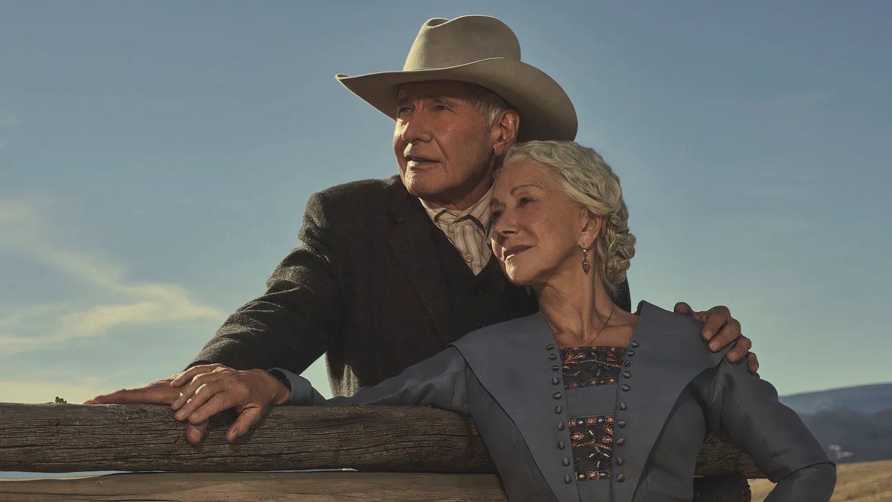 Harrison Ford as Jacob Dutton and Helen Mirren as Cara Dutton admiring the ranch they have built from what James started in 1923.