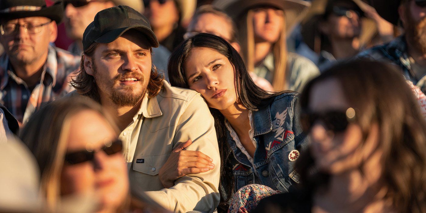 Luke Grimes as Kayce Dutton and Kelsey Asbille as Monica Dutton enjoying some alone time together at a rodeo in Yellowstone.