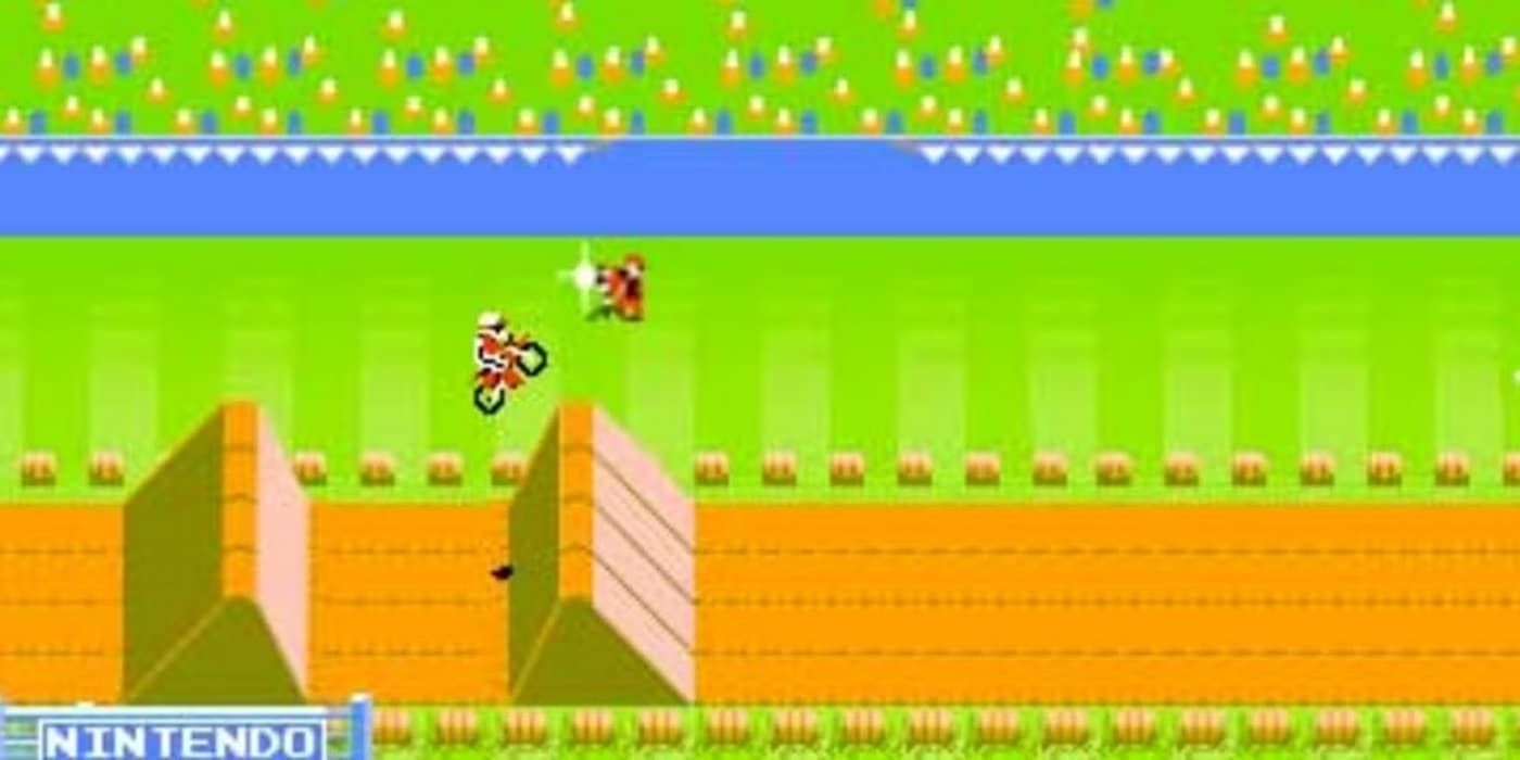 A rider jumps his motorbike off a ramp in Excitebike.