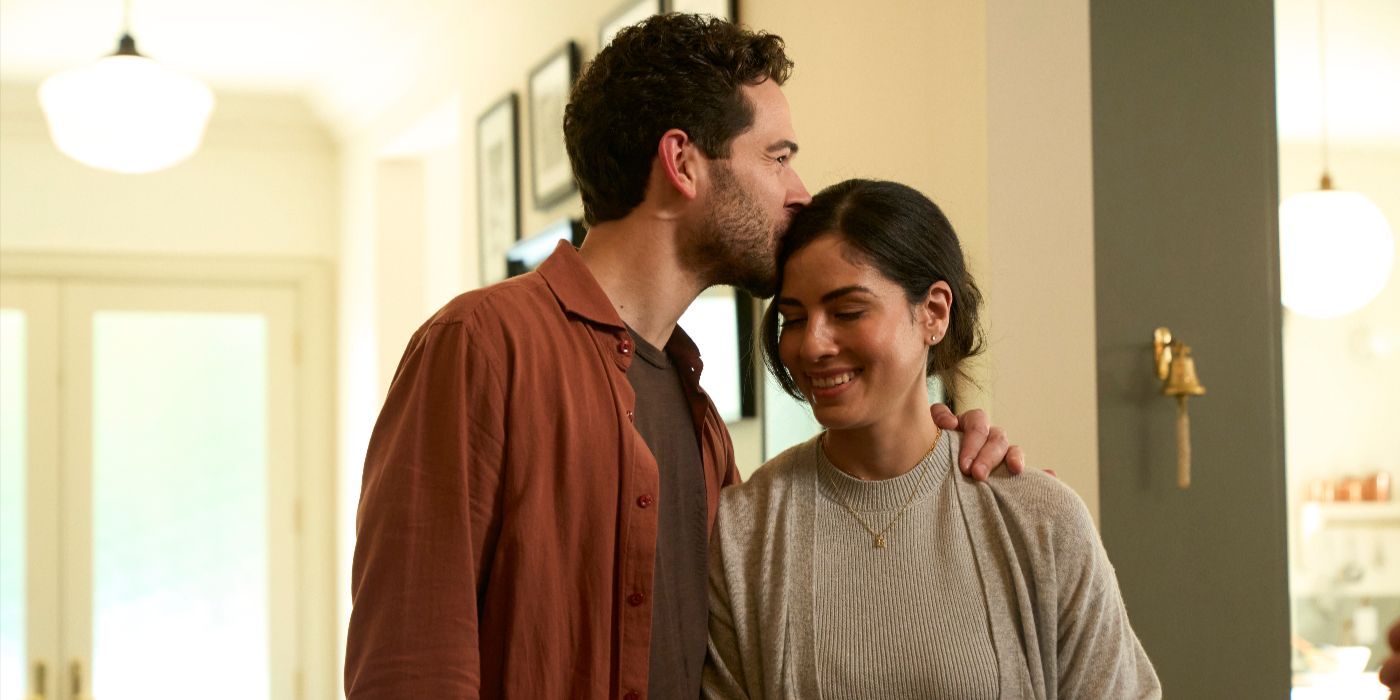 Frank Conley (Daniel Maslany) hugs his smiling wife Melissa Conley (Isabel Arraiza) in Accused