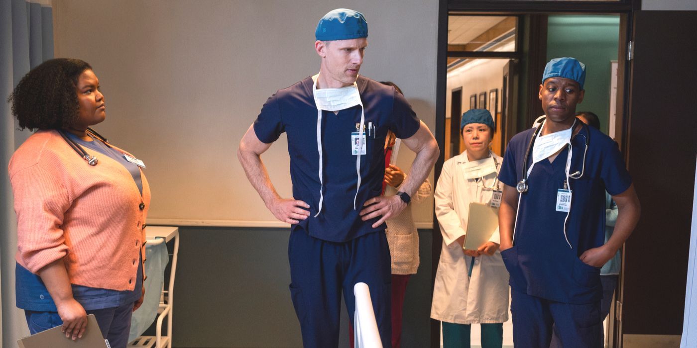 Nichols, played by Teddy Sears, stands in front of an empty bed with the surgical team in Brilliant Minds